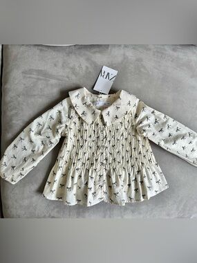Zara Cream Long-Sleeve Smocked Top with Black Bow Print
